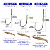 Close-up of 2/0 fluorescent shrimp hook showing luminous shank